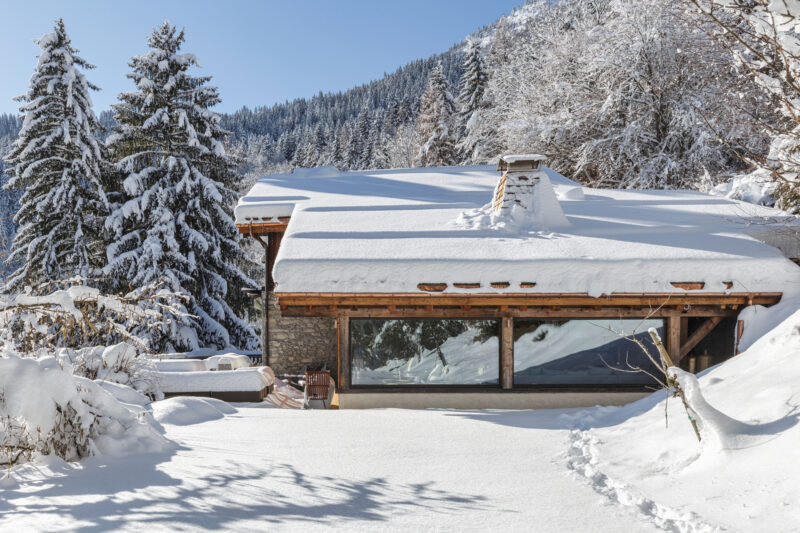Chalet in chamonix covered in snow