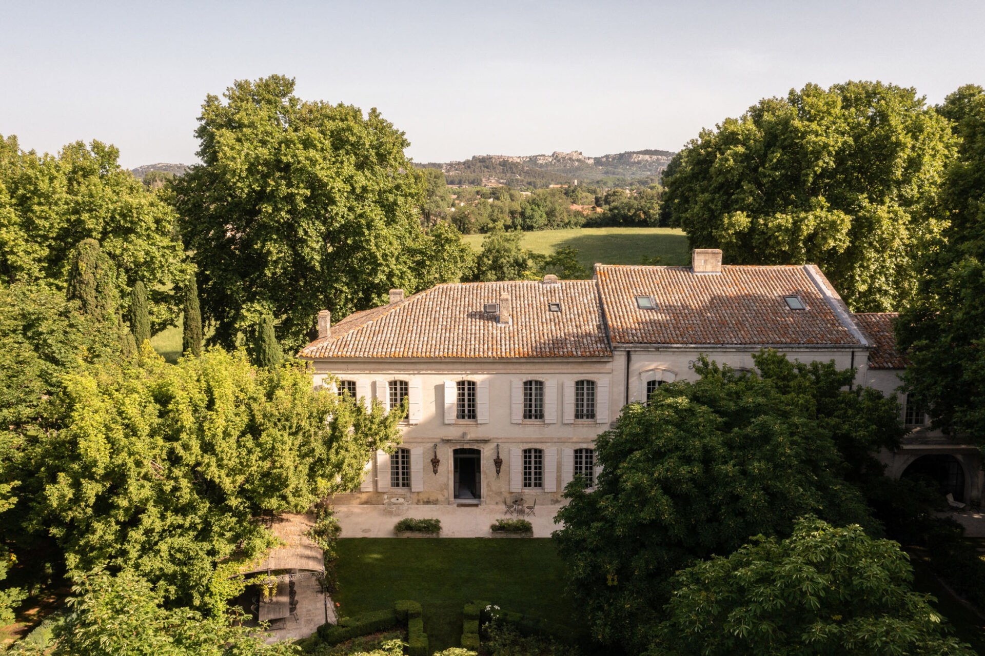 Provencal home surrounded by trees near Les Alpilles